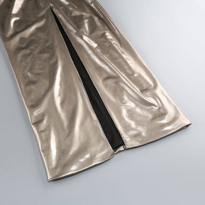Metallic silver fabric with a black zipper on a light gray background