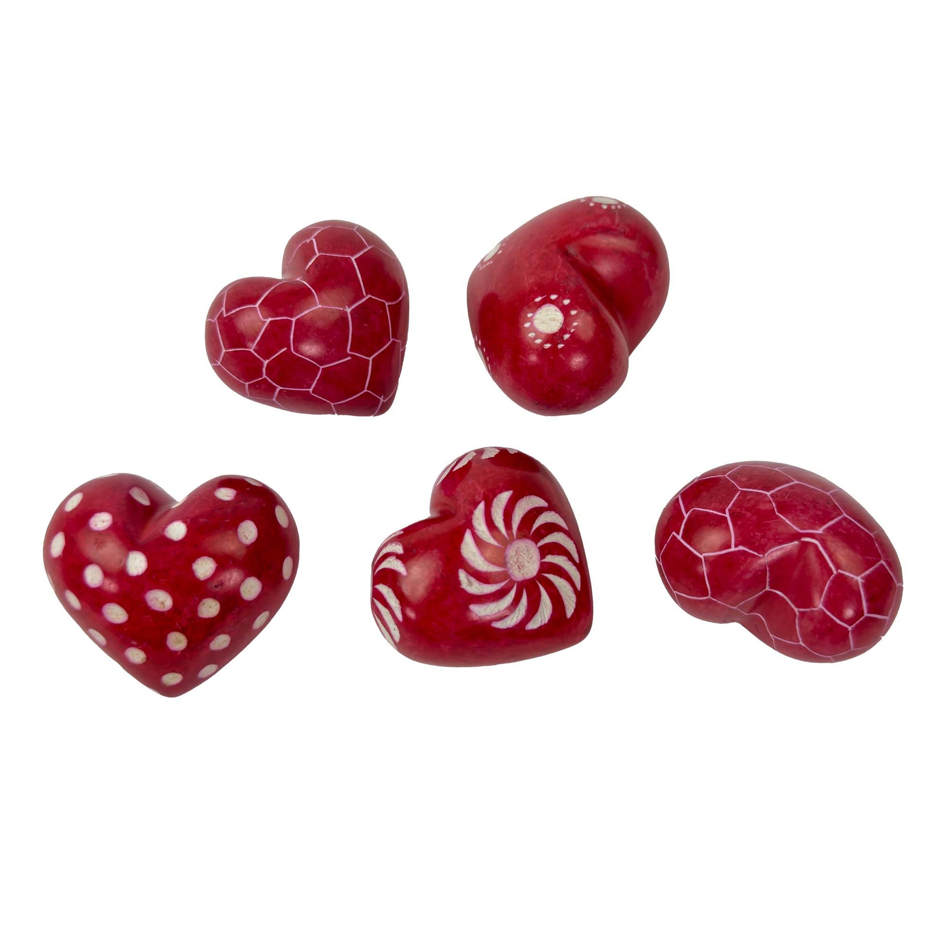 Set of red heart-shaped candies with different patterns on a white background