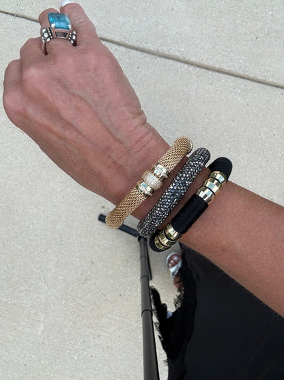 Holst + Lee Gold Mesh bracelet stacked with their sparkle bracelet and black and gold bracelet hand made. Paired with two other bracelets as a bracelet stack. Perfect gift.
