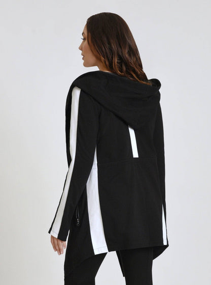 Black hoodie with white accents worn by a person on a white background
