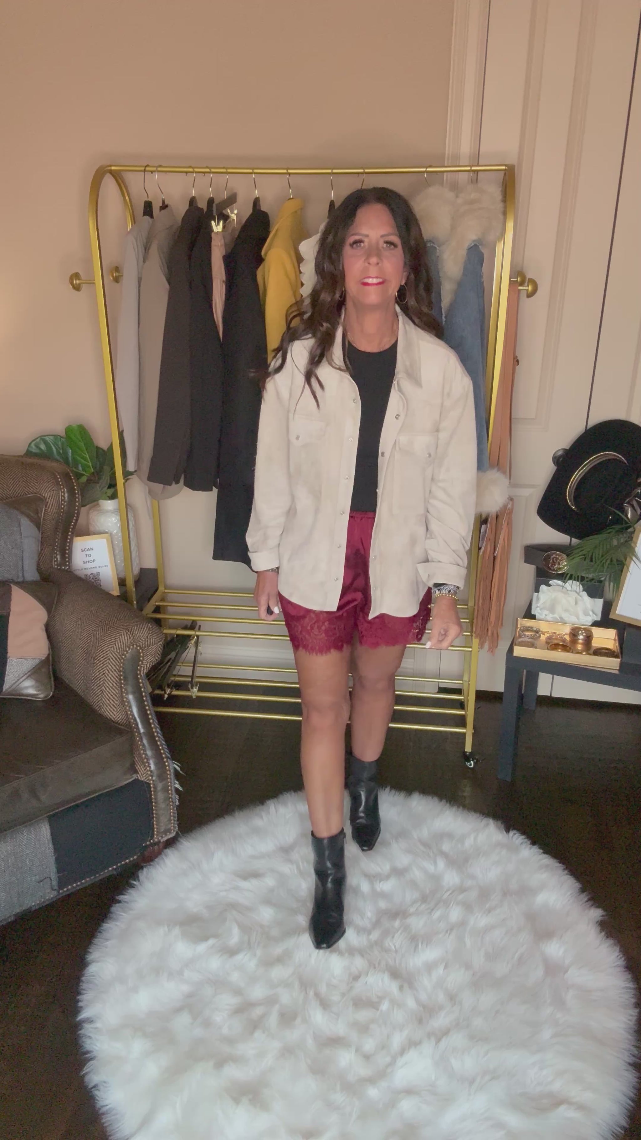 Video of the taupe Perfect Layer Lightweight Tie Blazer worn open over a black top and burgundy lace-trim shorts.